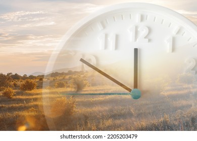 Landscape and close up of clock. Double exposure. Daylight Savings Time Concept. - Shutterstock ID 2205203479