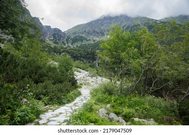 Landscape With Clouds Over Mountains And Forest, Stone Path, Zakopane, Morskie Oko, Poland