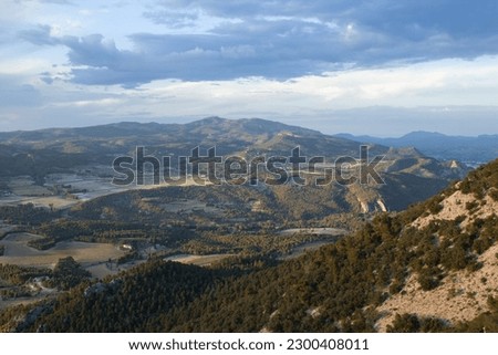 Landscape with clouds of the Sierra de Mariola from the Fuente Roja Natural Park in Alcoy, Spain
