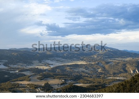 Landscape with clouds of the Sierra de Mariola from the Fuente Roja Natural Park in Alcoy, Spain