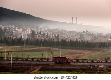 Landscape Of A Coal Town In South China, Coal Power Plant On The Mountain, Coal Mining Truck On The Road. Noise, Grain.