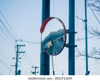 A Landscape With A Curved Mirror In The Japanese Countryside.