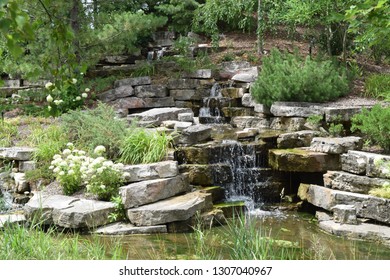 Landscape design with water feature - Shutterstock ID 1307040967