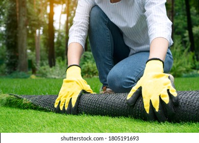 A Landscape Designer Doing A Green Lawn With The Artificial Grass