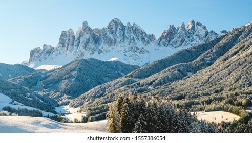 Landscape in Dolomites ski resort in clouds in Tyrol in winter Alps, Italy. Alpine mountains with white snow and blue sky. - Powered by Shutterstock
