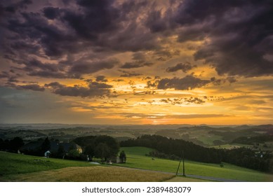 A landscape with a dramatic sky