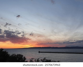 Landscape of a dramatic sunset at the beach