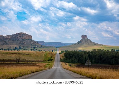 Landscape in the Eastern Freestate of South Africa with an empty road and mountains 