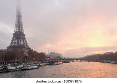 landscape with eiffel tower, fog and Seine river in Paris, France at sunset. - Powered by Shutterstock