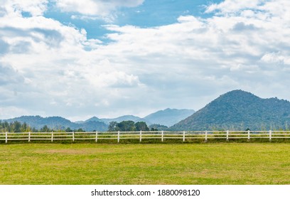 Landscape Empty Farm With Background Of Mountain Scape And Cloudy Sky. Wide Angle View, Day Light Image.