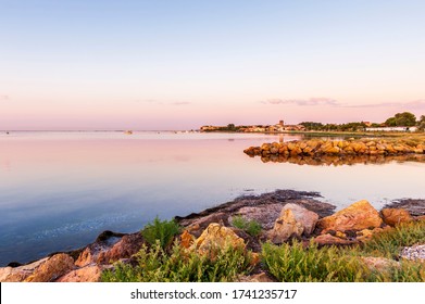 Landscape Of The Etang De Thau At Sunrise Near The Small Village Of Mèze In Hérault In Occitania, France