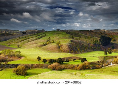 Landscape with farmland and cloudy sky, North Island, New Zealand