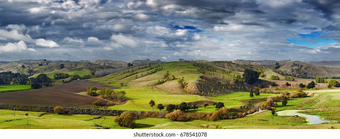 Landscape with farmland and cloudy sky, North Island, New Zealand
