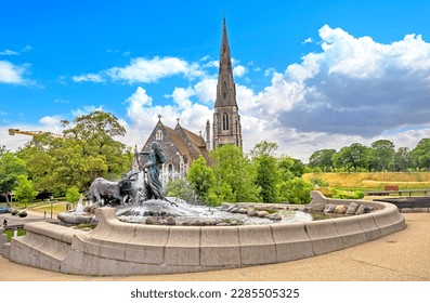 Landscape with Gefion Fountain and St. Alban's  Anglican Church in Copenhagen. Denmark