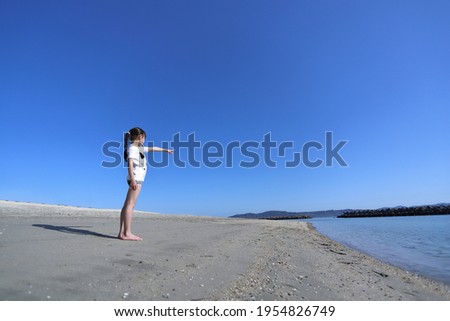 Similar – Young woman walks on the beach