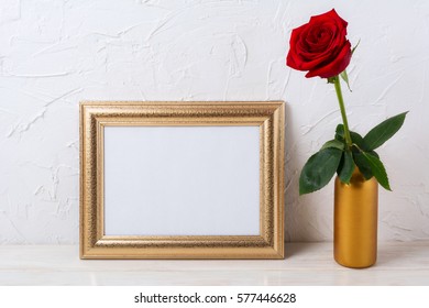 Landscape Gold Frame Mockup With Red Rose In Vase. Empty White Frame Mock Up For Presentation Design.