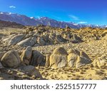 Landscape of granite rock formations set against the Sierra Nevada Mountains at Alabama Hills, California