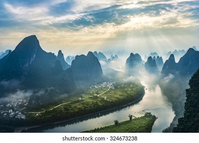 Landscape of Guilin, Li River and Karst mountains. Located near The Ancient Town of Xingping, Yangshuo County, Guangxi Province, China. - Powered by Shutterstock