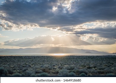 A Landscape Of High Dessert With Pyramid Lake Outside Of Reno, Nevada, In The Distance At Sunset.