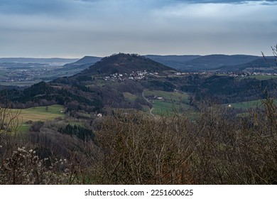 Landscape with hills and forests overlooking the castle ruin Hohenrechberg - Shutterstock ID 2251600625