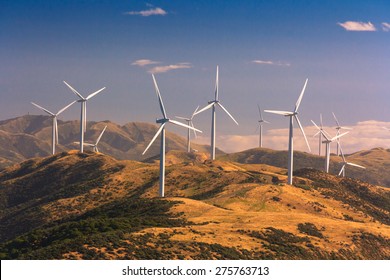 landscape with hills and wind turbines