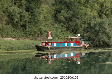 landscape houseboat canal green reflection - Powered by Shutterstock