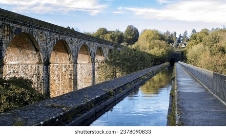 Landscape image of Chirk canal aqueduct water with railway viaduct bridge behind. Historic monument industrial revolution infrastructure engineering. - Powered by Shutterstock