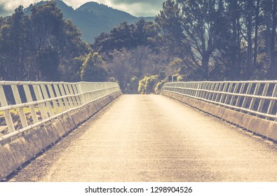 Landscape Image Of A One Way Bridge In New Zealand.