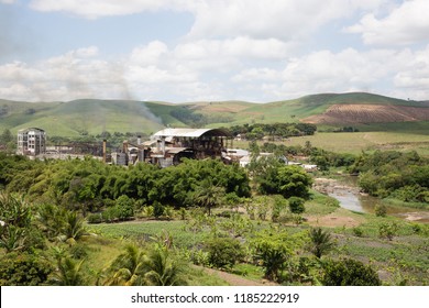 Landscape with industry for the processing of sugar cane. Around: river, riparian forest and plantations. Zona da Mata South of Pernambuco. Brazil.