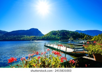 Landscape at Lake Altaussee in the Salzkammergut in Austria. Idyllic nature by the lake in Styria. Altaussee at Totes Gebirge with a view of the surrounding mountains.	