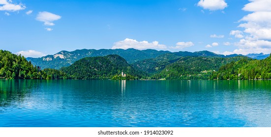 Landscape Of Lake Bled In Slovenia With The Island And Curch And The Alps Mountains In The Background