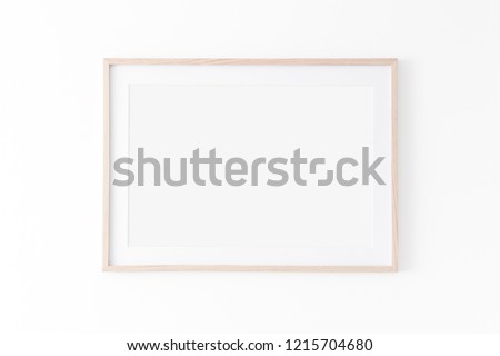 Landscape large 50x70, 20x28, a3,a4, Wooden frame mockup with passe-partout on white wall. Poster mockup. Clean, modern, minimal frame. Empty fra.me Indoor interior, show text or product