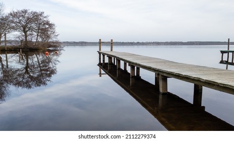 Landscape Leon French Lake In Landes South West France With Empty Pontoon Boat