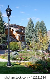 Landscape With Light Post In Vail, Colorado With Building In The Background At Fall Time