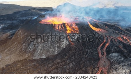 A landscape of lightening erupting from Mauna Loa Volcano in Hawaii with smoke and a hazy sky