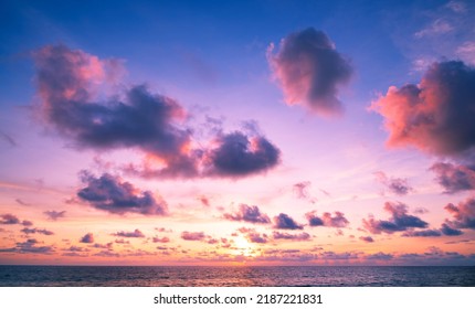 Landscape Long exposure of majestic clouds in the sky sunset or sunrise over sea with reflection in the tropical sea.Beautiful cloudscape scenery.Amazing light of nature Landscape nature background - Powered by Shutterstock