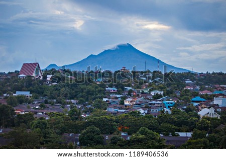Landscape of Manado City with Manado Tua Mountain in the background, North Sulawesi, Indonesia