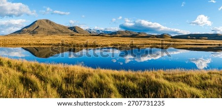 Landscape of Mount Guy reflected in the waters of Lake Clearwater on the South island of New Zealand; nature landscape of alpine mountain range at Ashburton Lakes, Hakatere conservation area