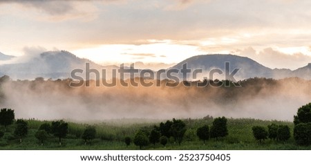 Similar – Image, Stock Photo Mountains covered with fog near lake in Thailand