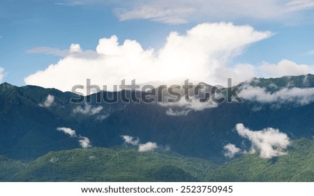Similar – Image, Stock Photo Mountains covered with fog near lake in Thailand