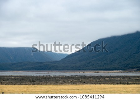 Landscape of mountain with dark clouds before a storm, south island Newzealand.