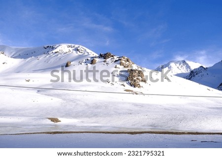 Similar – Image, Stock Photo Snow banks in the parking lot at the Rettenbach Glacier