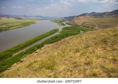 landscape with mountains, forest and a river in Siberia - Shutterstock ID 630715097