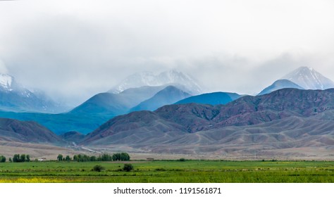 Landscape of a mountains with rainy clouds