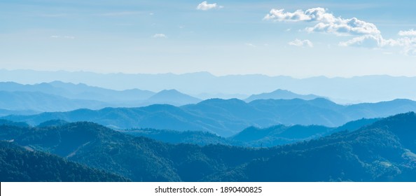 Landscape of mountains range with morning frog for mountain background.