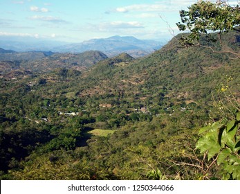 Landscape Near Cinquera, El Salvador. Forested Hills, Jungle, Village Below. Taken From A Viewpoint In A Former Camp Of Guerilla Warriors (of The El Salvador's Civil War). Taken In December.