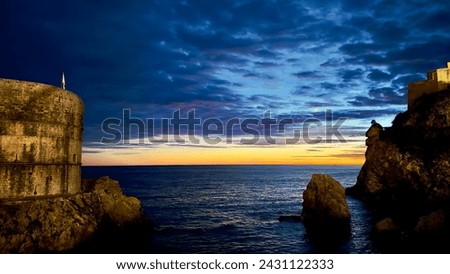 Landscape of Night in Dubrovnik, Croatia. Wonderful scenary with beautiful blue sky, clouds, sunset and moon above the sea. Perfect for desktop wallpaper.