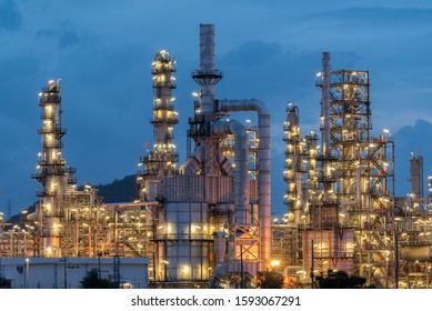 Landscape Of Oil And Gas Refinery Manufacturing Plant., Petrochemical Or Chemical Distillation Process Buildings., Factory Of Power And Energy Industrial At Twilight Sunset., Engineering Petroleum.