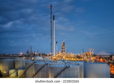 Landscape of oil refinery industry with oil storage tank