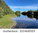 Landscape from Oulu. Oulujoki river from Turkasaari and fallen tree from Tuira.